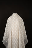 An ivory-white flat embroidery organza fabric, with a pattern combining a grid and floral-filled polka dots.