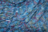 A 3D textured, plaid-patterned embroidery fabric with a plush feel, in a palette of various blues and teals.