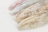 A fabric with 3D textured flowers and sequin embroidery, shown in various pastel color options.