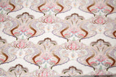 A luxurious sequin embroidery fabric, with a classic damask or brocade pattern in a soft, multi-color pastel palette.