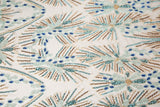 An Art Deco style beaded fabric, with a radiating fireworks or sunburst pattern in aqua, royal blue, and bronze.
