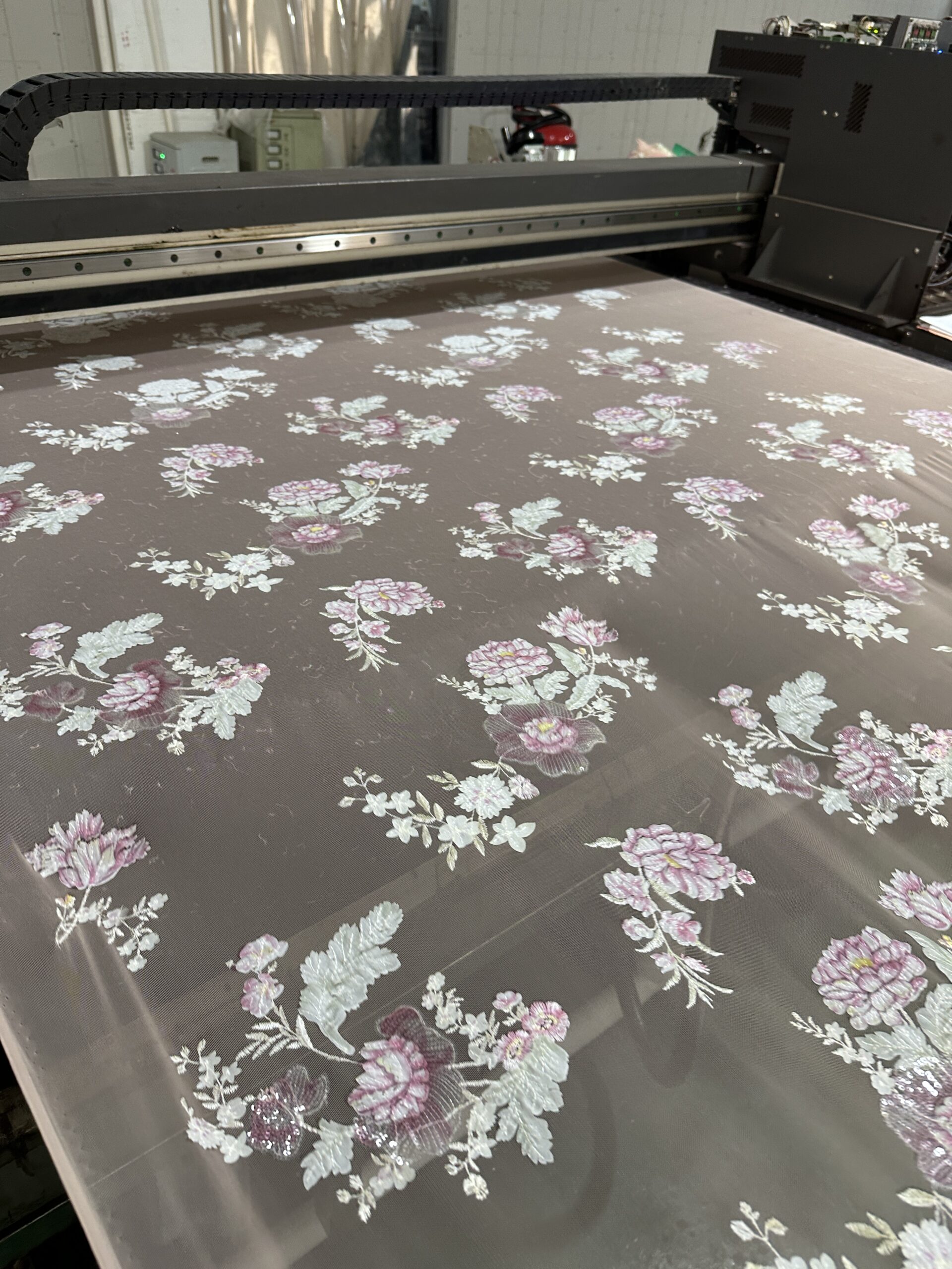Advanced Embroidery & Production Advanced multi-head embroidery machine in operation