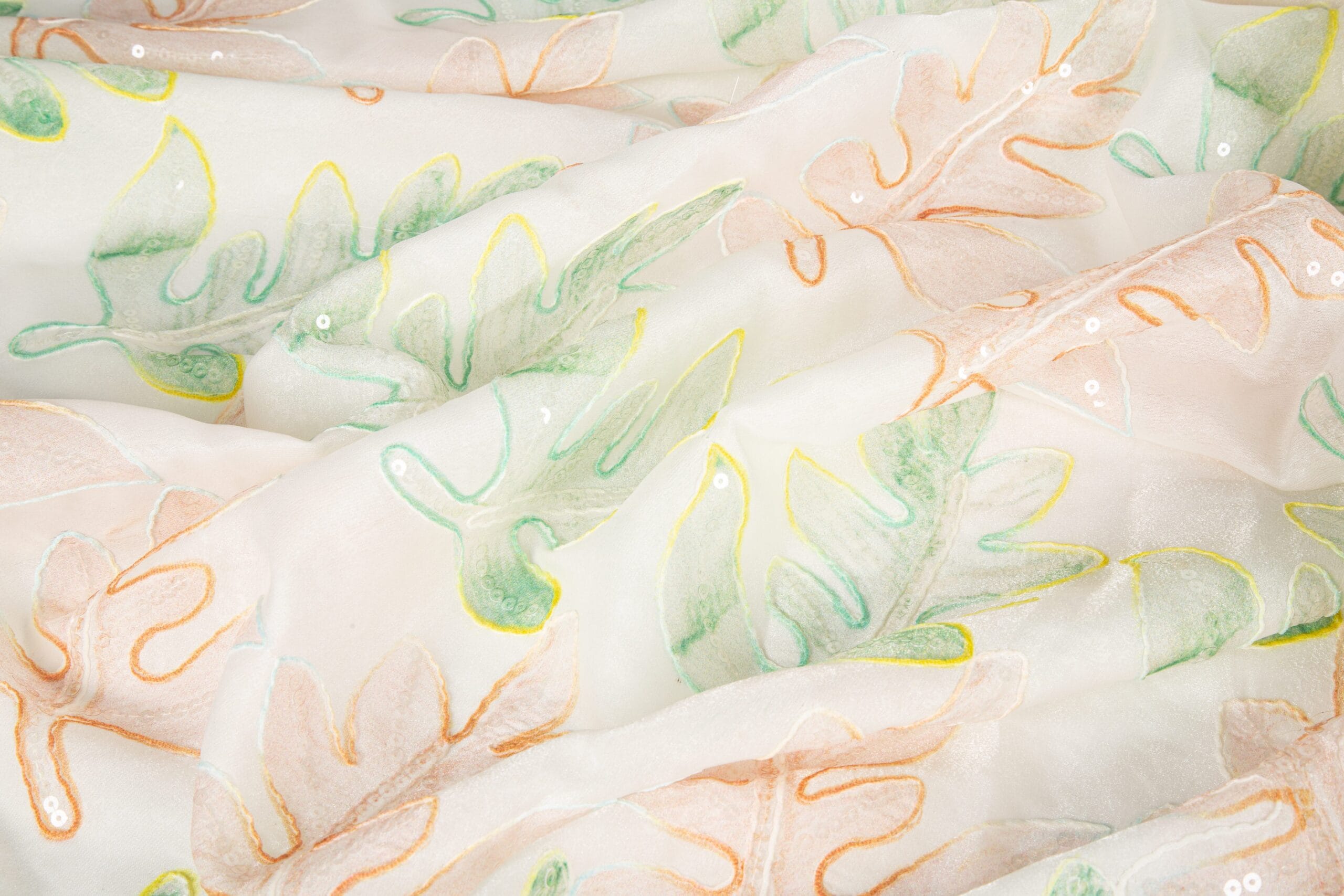 Raised Cord Embroidery Fabric Texture Close-up of raised cord embroidery fabric showing dimensional surface texture and clearly defined floral patterns